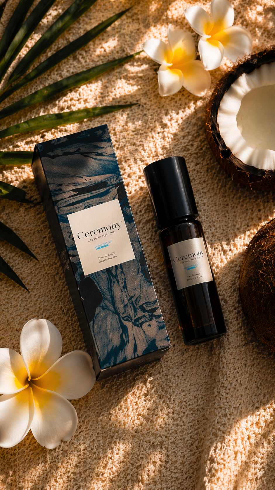 ceremony organic hair growth oil - hair oil bottle coconut plumeria flatlay - made in small batches on kaua'i